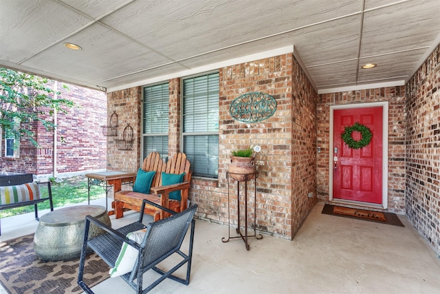 2745 Sunlight Dr, Little Elm, TX 75068 - doorway to property featuring a porch
