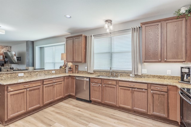 2745 Sunlight Dr, Little Elm, TX 75068 - kitchen with black range with electric stovetop, light stone counters, stainless steel dishwasher, light hardwood / wood-style floors, and sink