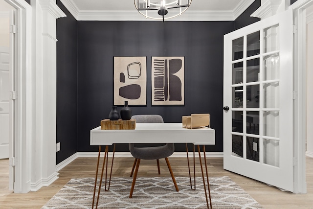 home office with crown molding, wood-type flooring, and an inviting chandelier