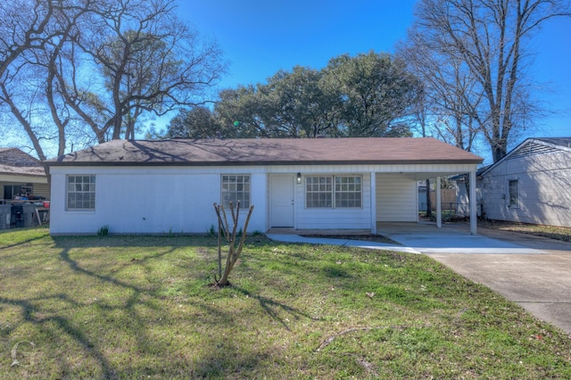 single story home with a carport and a front yard