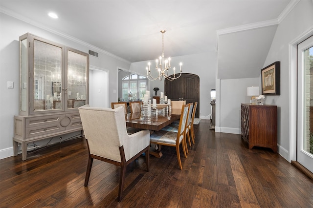 dining area featuring a notable chandelier, crown molding, and dark hardwood / wood-style floors