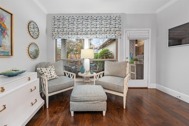 living area featuring ornamental molding and dark hardwood / wood-style floors
