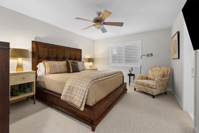 bedroom with light carpet and ceiling fan