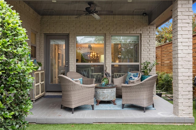 view of patio featuring ceiling fan