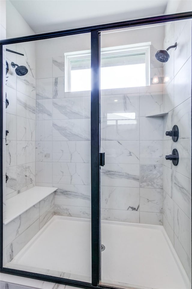 bathroom featuring walk in shower