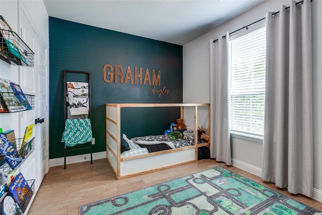 bedroom featuring wood-type flooring