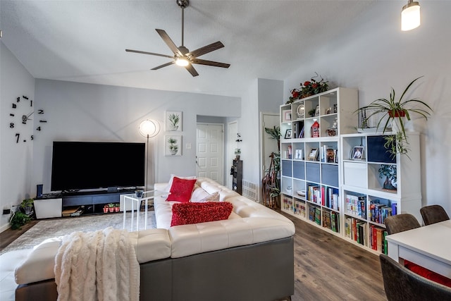 8545 Midpark Rd Unit 40, Dallas, TX 75240 - living room with lofted ceiling, ceiling fan, and dark wood-type flooring