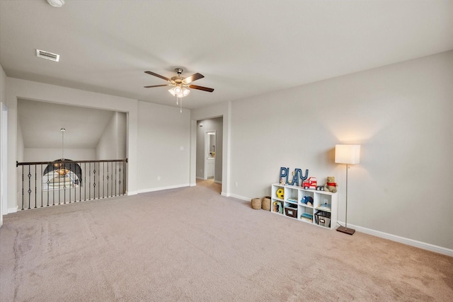 recreation room with a ceiling fan, carpet, visible vents, and baseboards