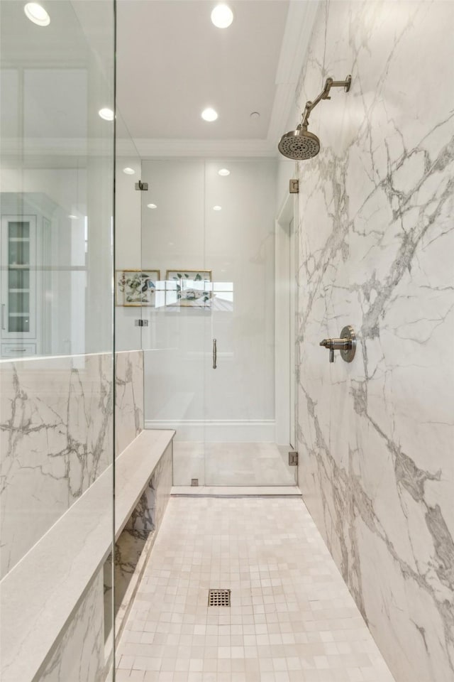 bathroom featuring tiled shower