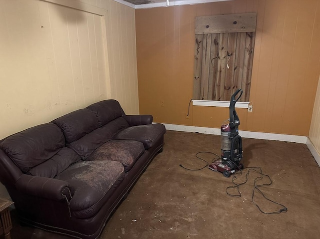 living room with wood walls