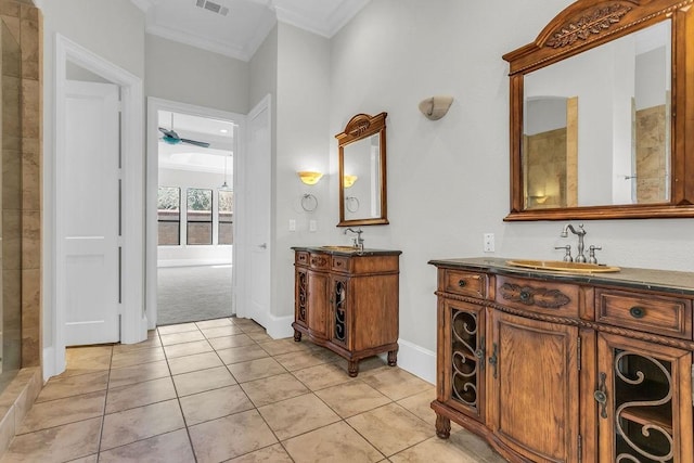 full bath featuring crown molding, two vanities, visible vents, a sink, and tile patterned flooring