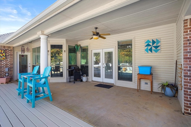 deck with ceiling fan, a grill, and french doors