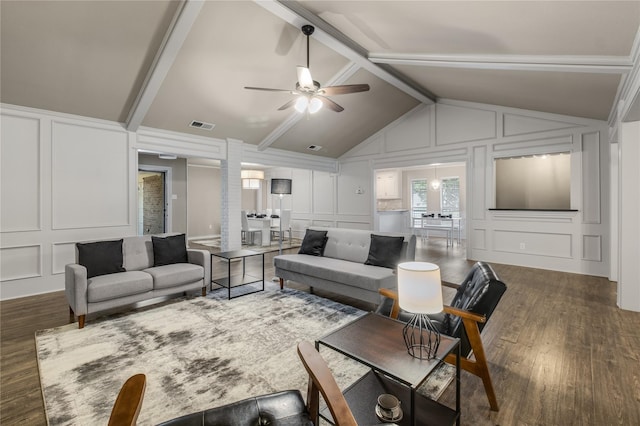 living room featuring ceiling fan, lofted ceiling with beams, and dark hardwood / wood-style floors