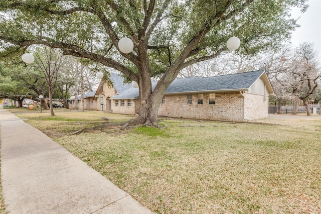 view of front of property with a front lawn