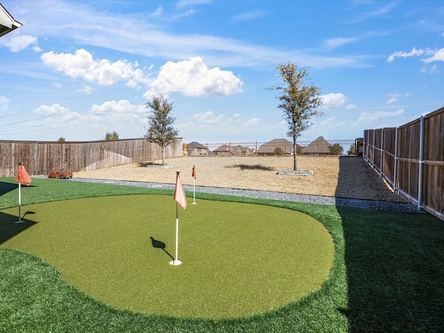 view of property's community featuring a fenced backyard