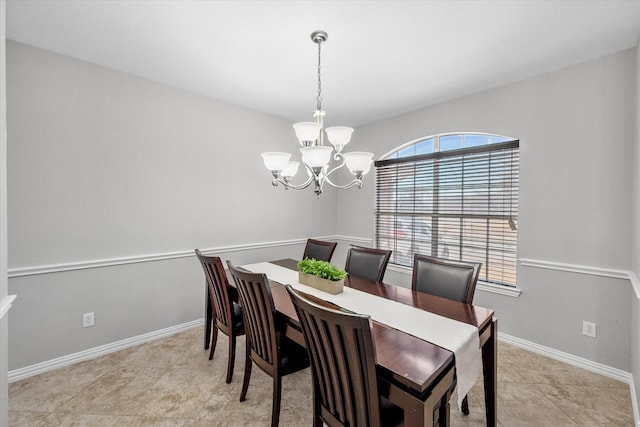 dining space with arched walkways, light tile patterned floors, visible vents, an inviting chandelier, and baseboards