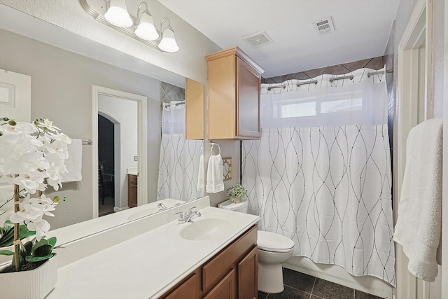 full bath with toilet, vanity, visible vents, tile patterned floors, and shower / bathtub combination with curtain