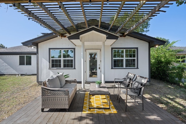 deck with an outdoor living space and a pergola