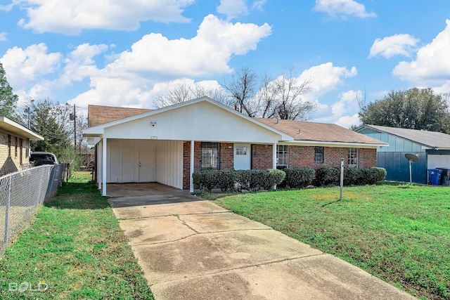 single story home with a front lawn and a carport