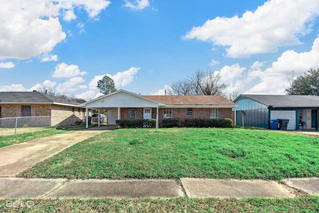 ranch-style home with a front lawn and a carport