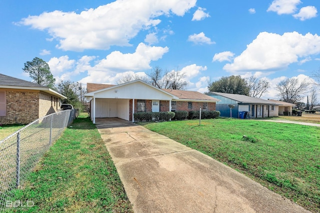 single story home with a front yard and a carport