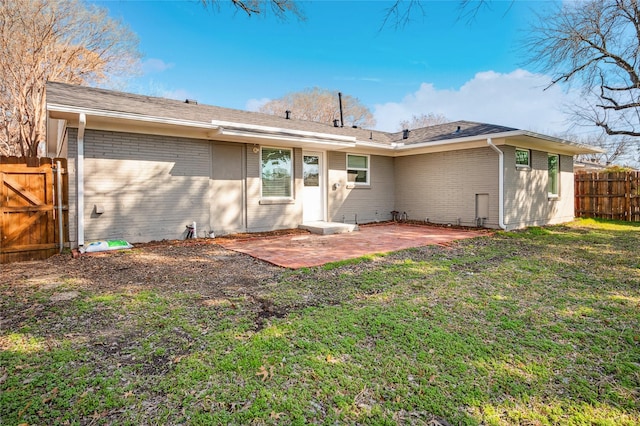 3126 Colchester Dr, Farmers Branch, TX 75234 - rear view of house featuring brick siding and a patio area