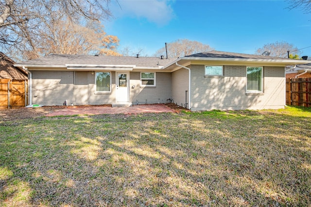 3126 Colchester Dr, Farmers Branch, TX 75234 - rear view of property featuring brick siding, a patio, and a shingled roof