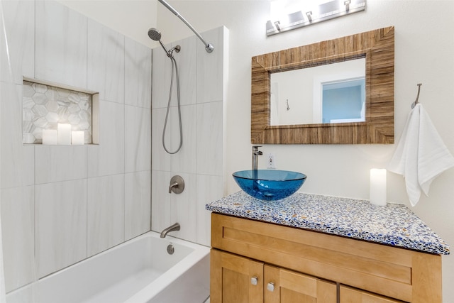 full bathroom featuring shower / bath combination and vanity