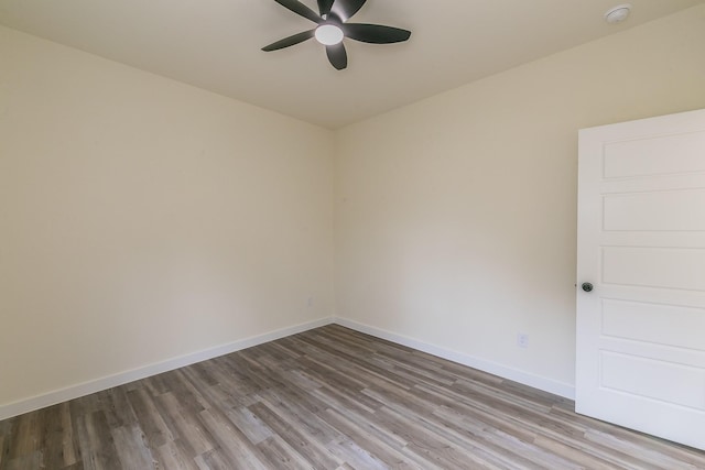 unfurnished room featuring ceiling fan and light hardwood / wood-style flooring