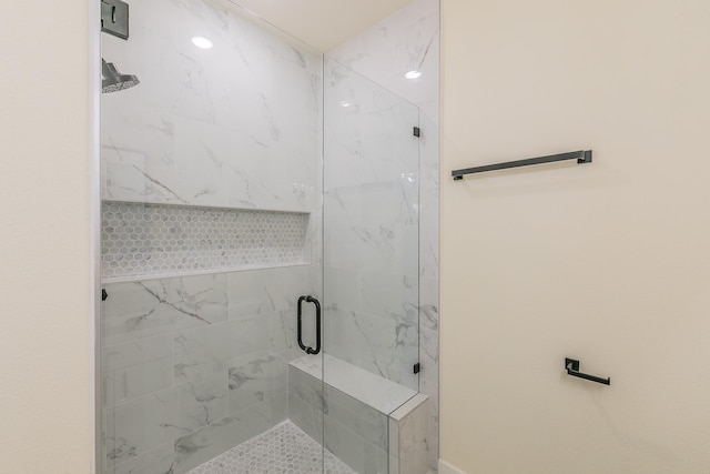 bathroom with an enclosed shower