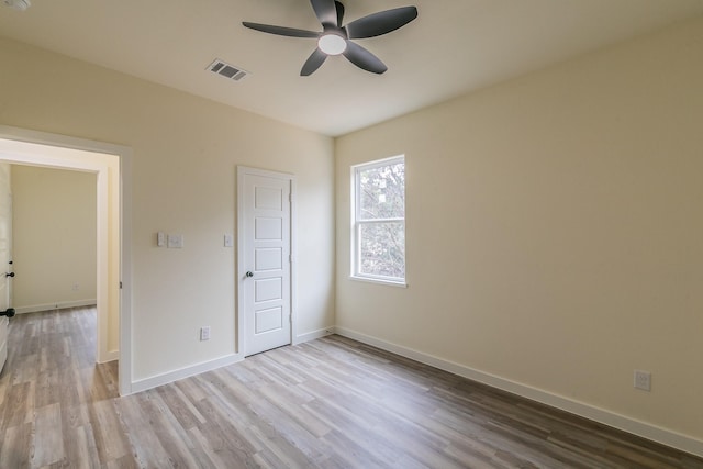 unfurnished bedroom with light hardwood / wood-style floors and ceiling fan