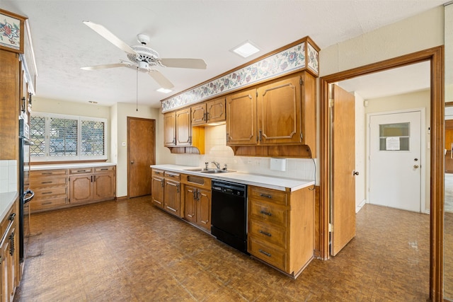 kitchen featuring wall oven, sink, tasteful backsplash, ceiling fan, and dishwasher