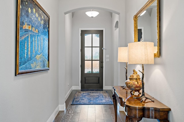 foyer entrance with hardwood / wood-style floors