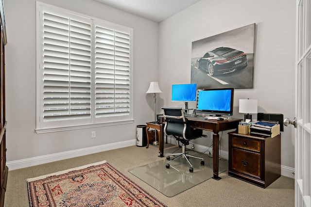 office space with light colored carpet