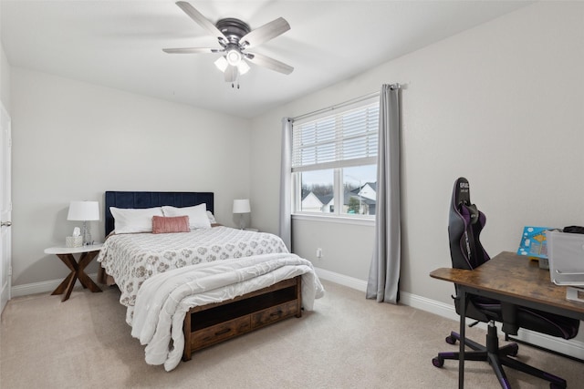 bedroom featuring ceiling fan and light colored carpet