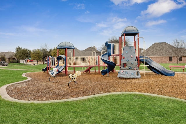 view of play area featuring a lawn