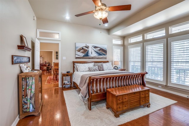 bedroom featuring baseboards, a ceiling fan, recessed lighting, and light wood-style floors