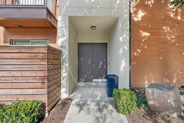 doorway to property featuring a balcony