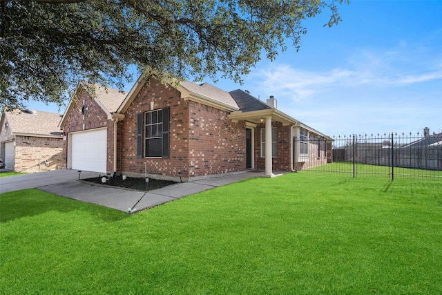 view of side of home featuring brick siding, a yard, a chimney, fence, and a garage