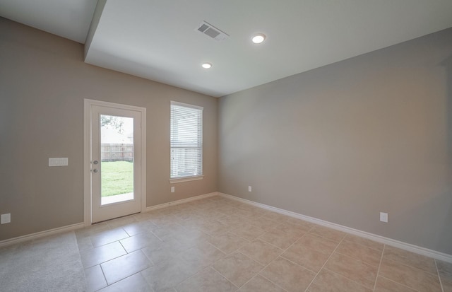 view of tiled spare room