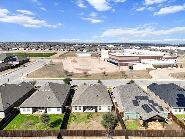 birds eye view of property with a residential view