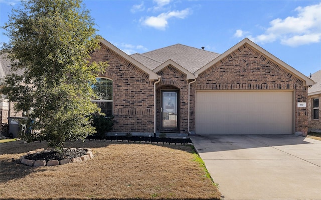 view of front facade featuring concrete driveway, brick siding, roof with shingles, and an attached garage