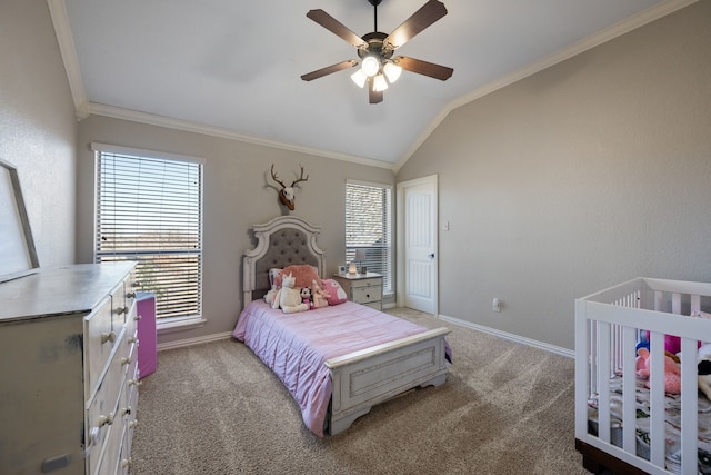 bedroom with crown molding, vaulted ceiling, baseboards, and light colored carpet