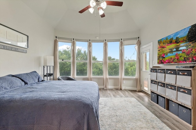 4109 Chantilly Ln, Frisco, TX 75036 - bedroom with vaulted ceiling, wood finished floors, ceiling fan, and baseboards