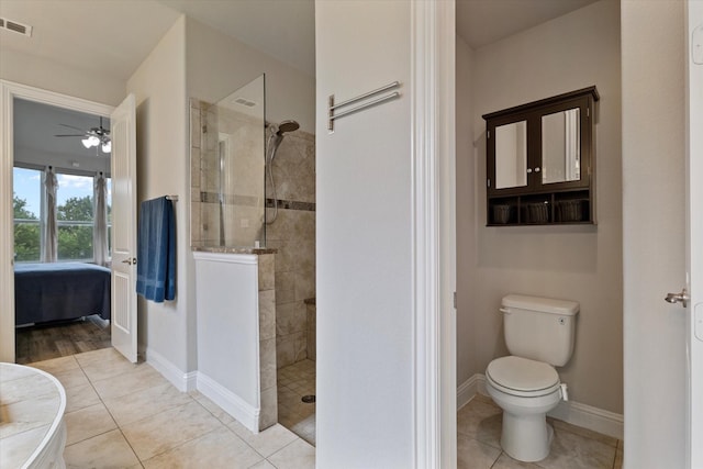 4109 Chantilly Ln, Frisco, TX 75036 - bathroom with ensuite bathroom, walk in shower, toilet, a ceiling fan, and baseboards