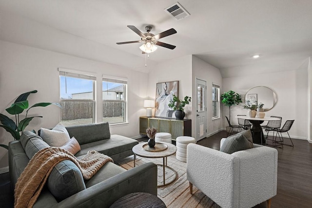 living area featuring recessed lighting, visible vents, dark wood-type flooring, a ceiling fan, and baseboards