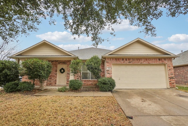 single story home featuring brick siding, a shingled roof, driveway, and a garage