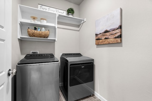 3002 Northshore Dr, Celina, TX 75009 - laundry area with washer and dryer and wood finished floors