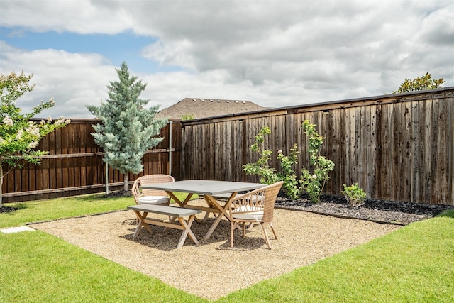 3002 Northshore Dr, Celina, TX 75009 - fenced backyard featuring a patio and outdoor dining area