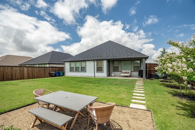3002 Northshore Dr, Celina, TX 75009 - rear view of house with a patio, a shingled roof, a fenced backyard, and outdoor dining space